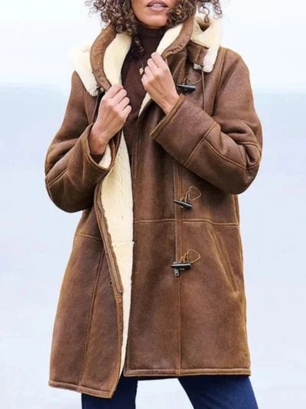 Cozy women's hooded long jacket – shearling lined winter coat with relaxed casual fit